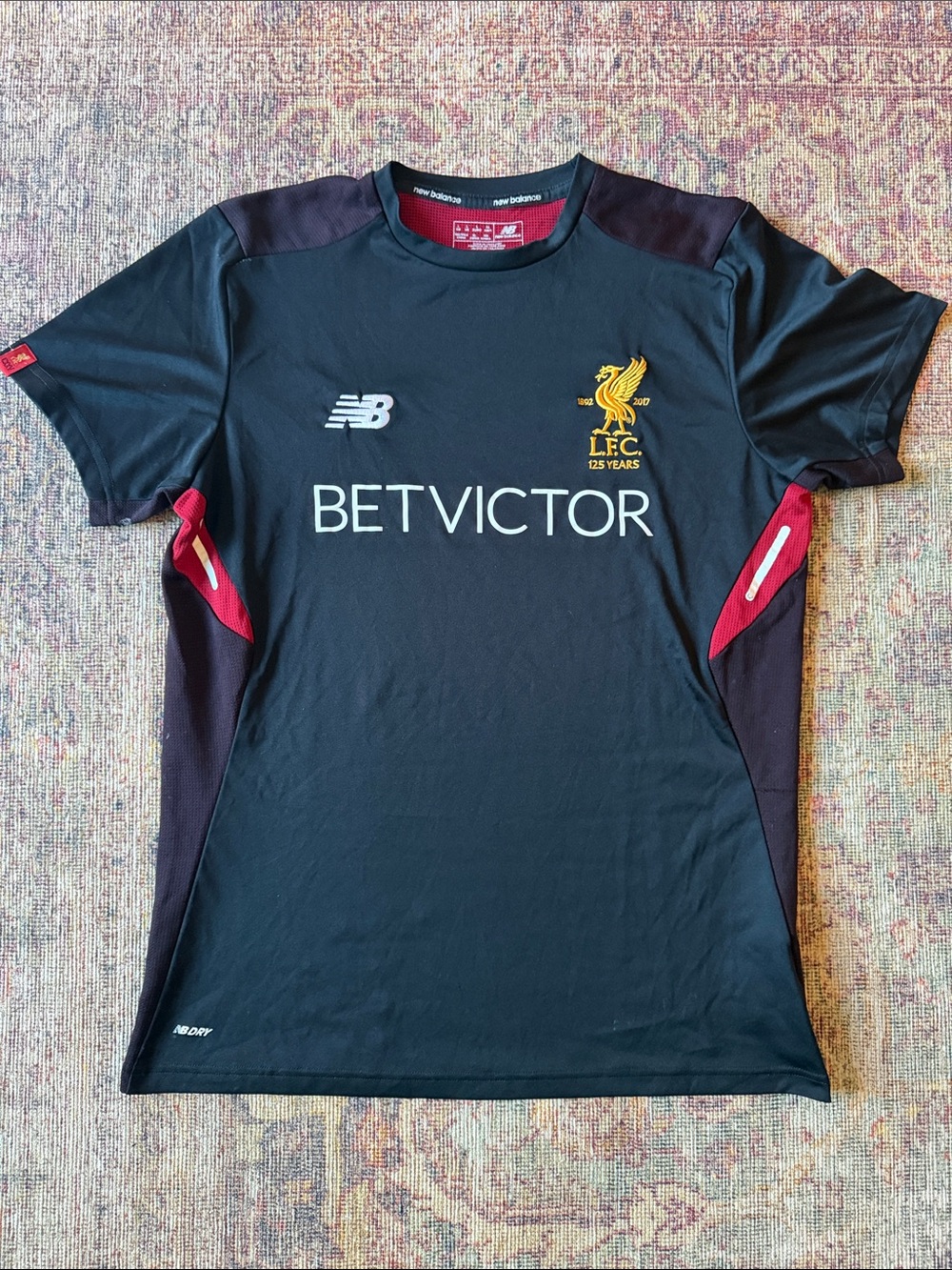 New Balance Black Liverpool FC Training Jersey with Red and Gold Details